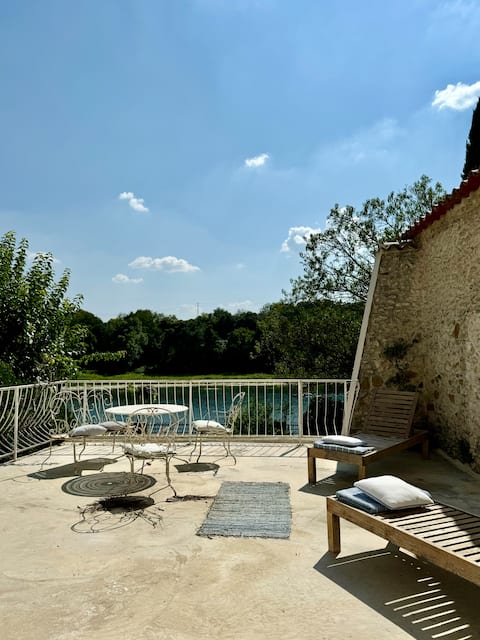 Building • River view • Hot tub • Beach access