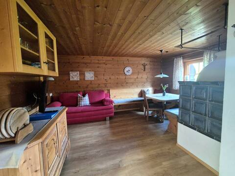 Top Airbnb: Mountain-View Chalet Apartment with Tiled Stove Farm Stay in Alpbach
