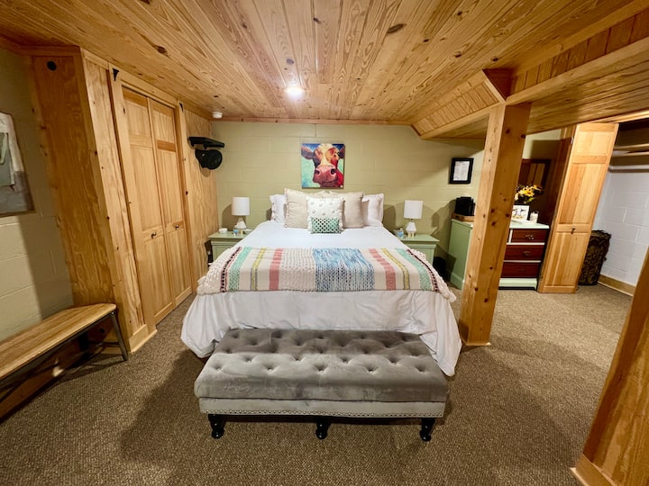 As you exit the side of the cabin, through the cabin, you will step into the perfect space for another couple or kids! You have everything that you need in this little retreat. The bedroom was recently designed to promote joy!