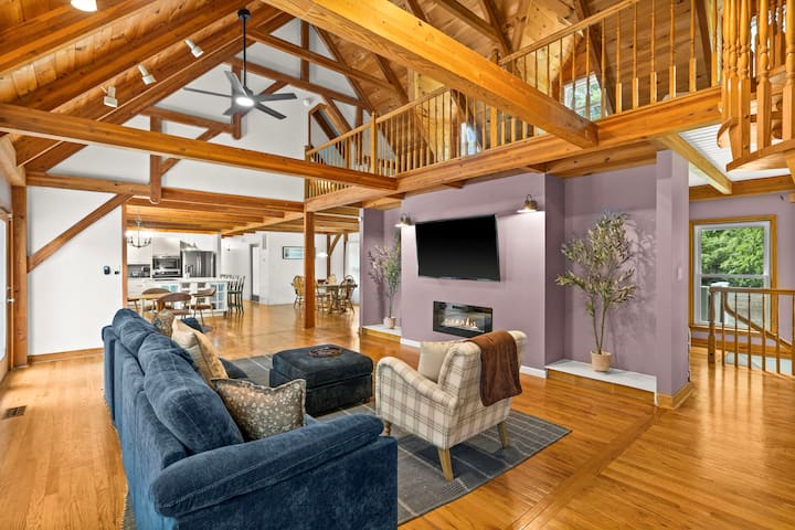 Warm, inviting living area with lake views & a cozy place to watch a movie. Roku TV with access to all of your own accounts!
