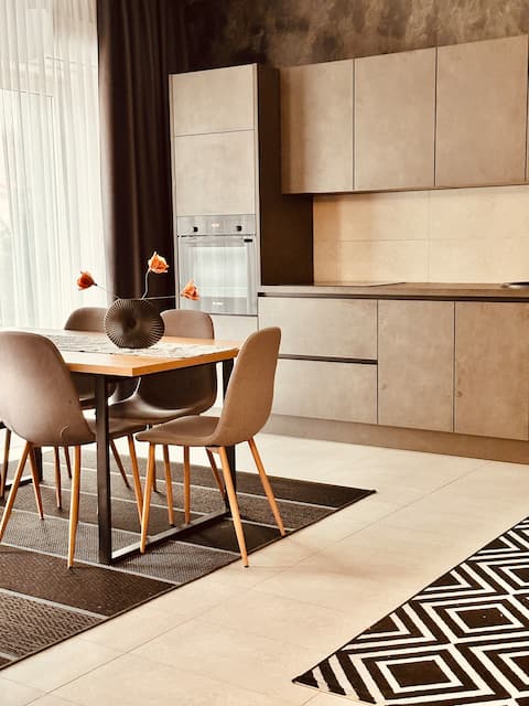 Delightful apartment with fireplace and rocking chair