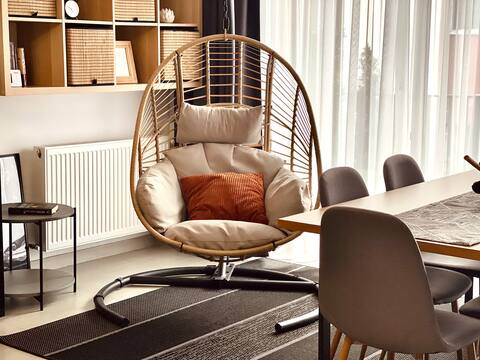 Delightful apartment with fireplace and rocking chair