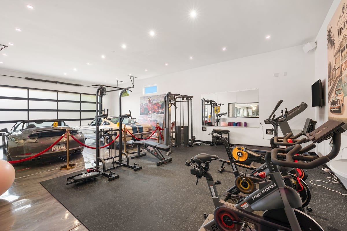 Private gym with cardio and weight equipment