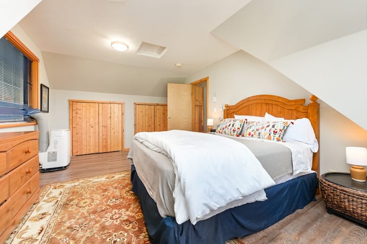 The Loft's bedroom holds a queen size bed, large dresser and space for an air mattress. Portable air conditioning for the warmer summer nights. A private and quiet getaway. New Saatva mattress.