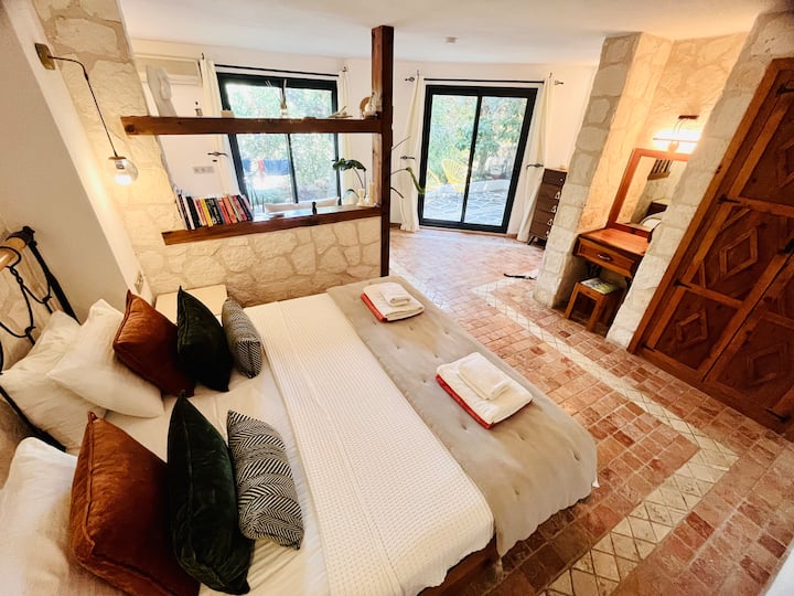 Rest in comfort in Villa Kucuk’s bedroom, designed for a peaceful night’s sleep.