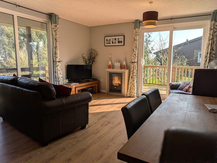 Enjoy an evening by the electric fireplace. Or slide open the patio doors during the day to enjoy the birds singing.