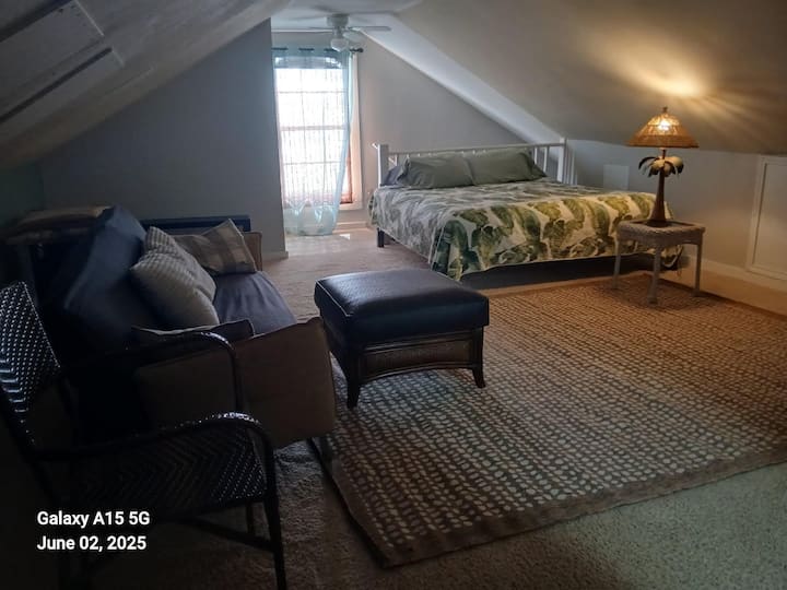 King size bed , Futon, TV,  dorm fridge. 
