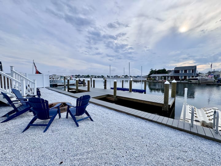 Backyard and private dock at Lake Louise beach house