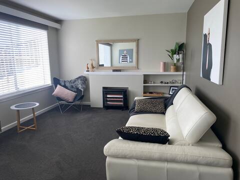 Popular Airbnb listing: "The Moorings" 1970's well maintained apartment in Sandy Bay