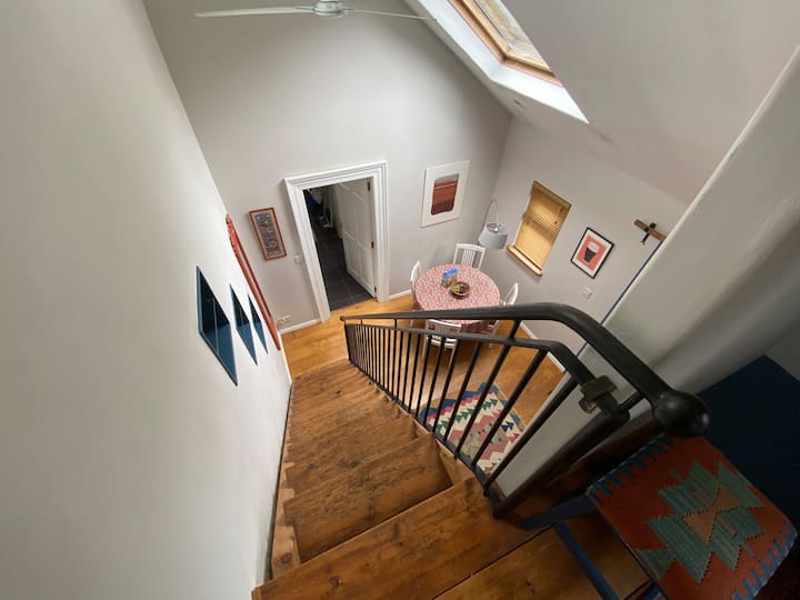 Steep stairs down from the bedroom