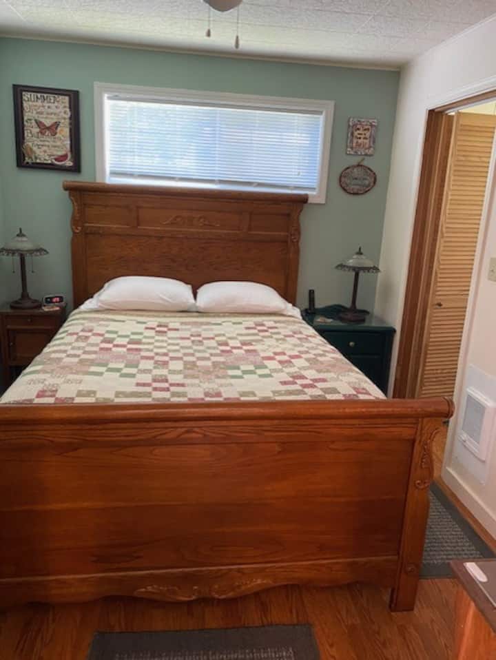 - Queen Bed with Lots of Blankets and Comforters To Make for a Warm and Cozy Night - 