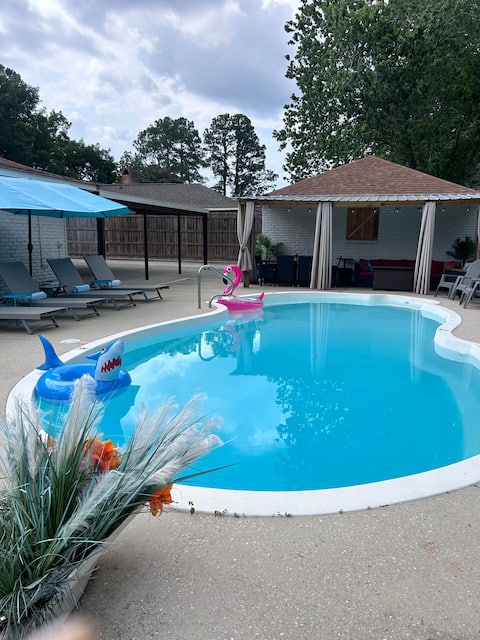 Modern 4 bed/ 3.5 bath home with heated pool.