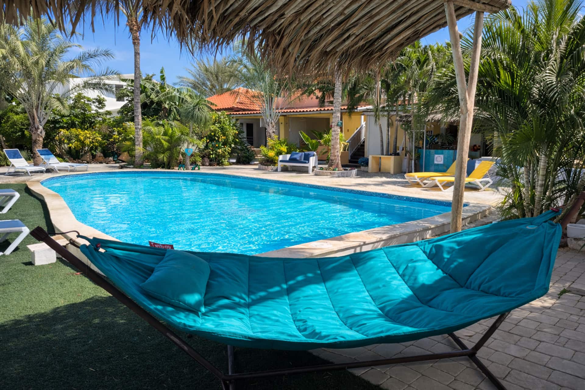Tropical Garden Escape w/ Pool • Walk to Beach