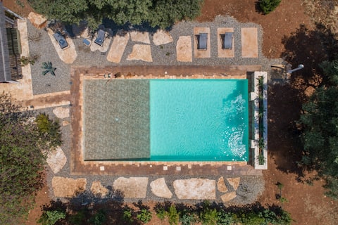 Trulli, cicadas and olives - Valentina's houses