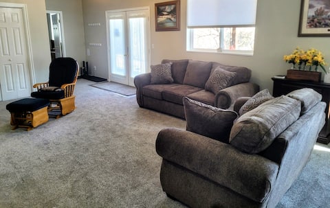 Popular Airbnb listing: Cheerful 2 bedroom lower level suite with hot tub. in Ogden / Clearfield