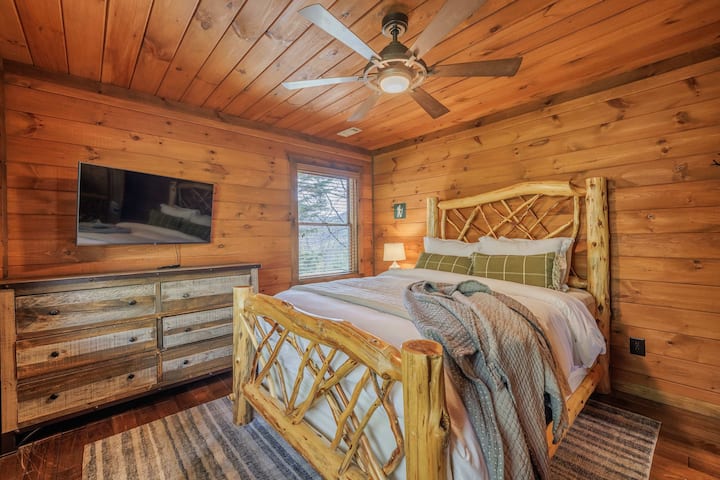 Upstairs bedroom at Above the Clouds — tucked above the treetops in this rustic North Georgia mountain cabin rental near Blue Ridge, GA.