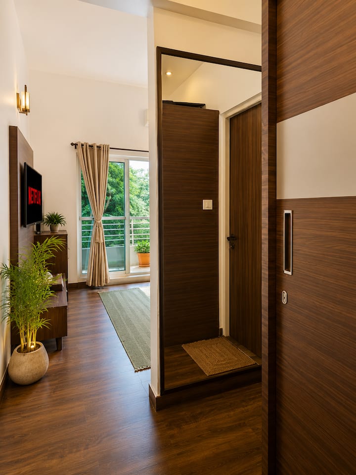 The master bedroom has an attached bathroom.