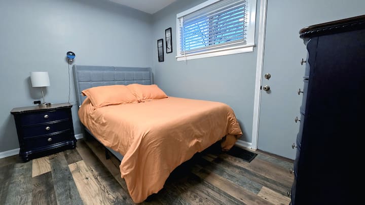 One full bed with a blanket and pillow in the closet.