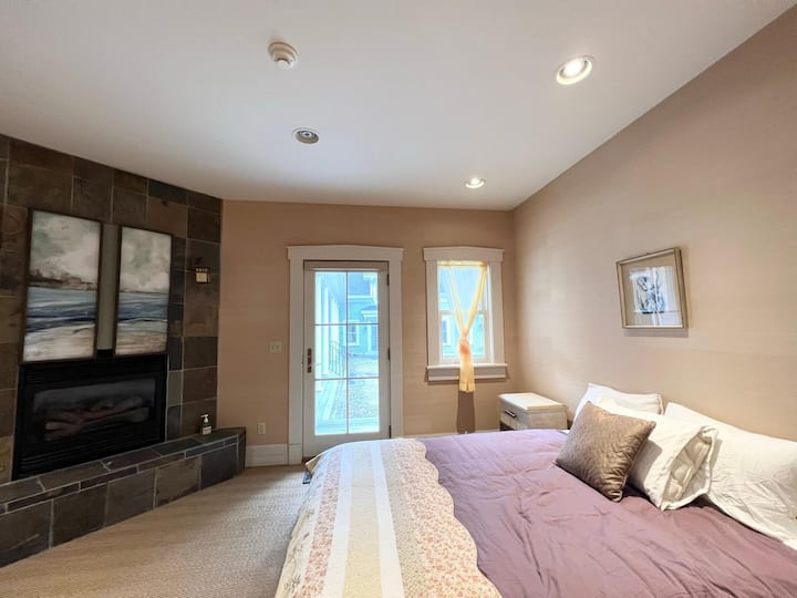 Bedroom in suite wing w/queen bed.