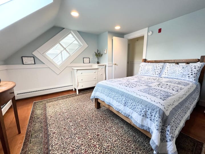 Bedroom in farmhouse w/full bed and bathroom across the hall.
