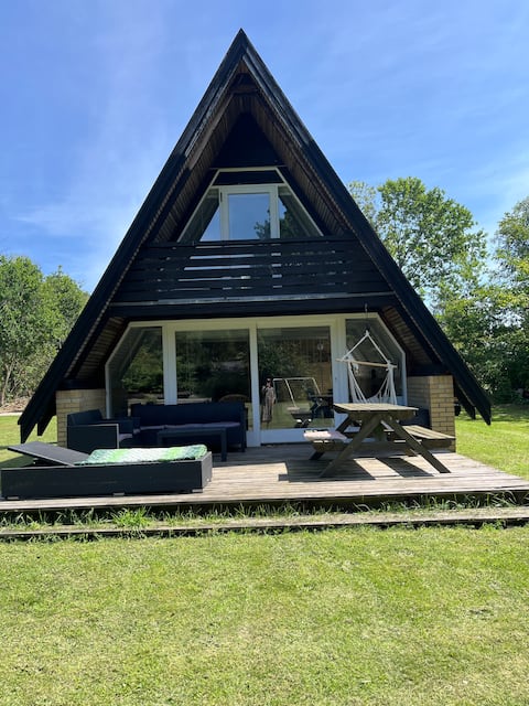 Lovely A-summer house located by Fjellerup beach