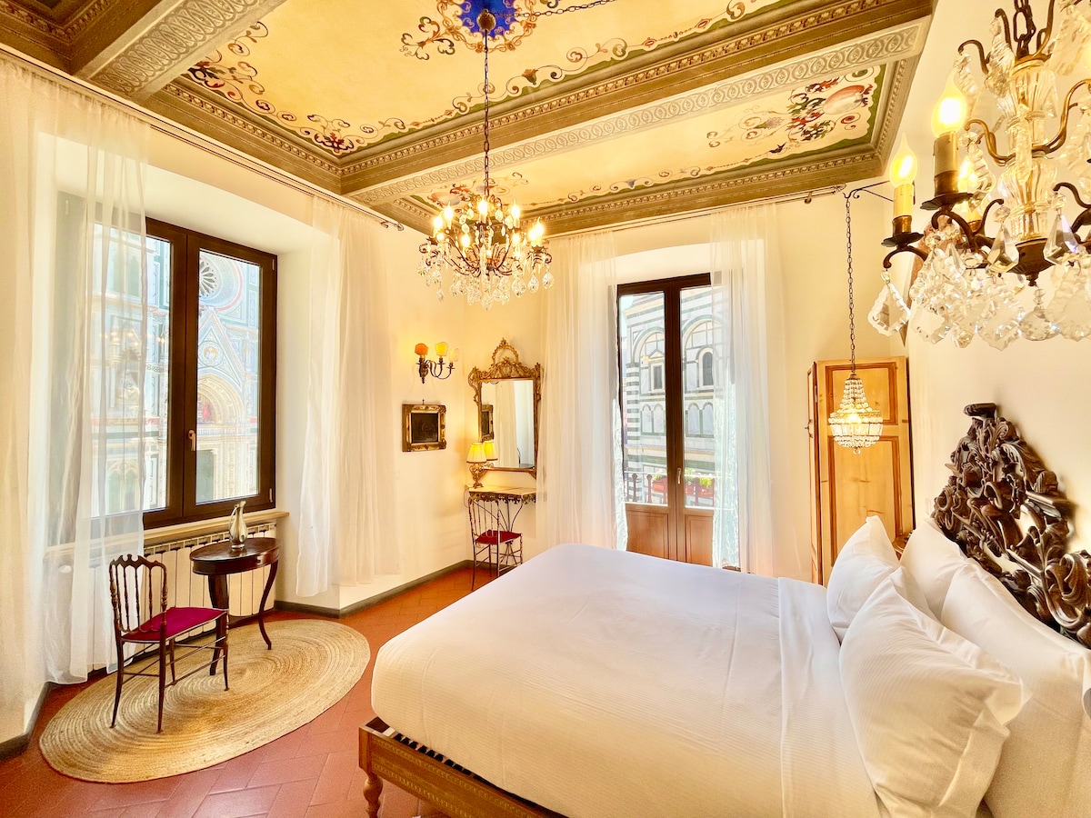 Master bedroom with just the right amount of chandeliers. Windows overlooking the Duomo, and Baptistery, with access to your own private balcony and a 250º view of the Piazza that won't make you feel bad if you don't leave the house for three days