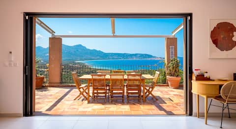 Pool villa with pool and view of  Calvi Bay