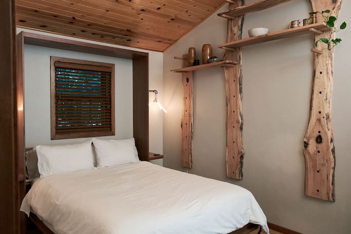 Queen bedroom at the back of the house. The smallest space, but private.