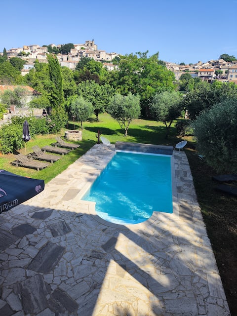 House with pool and village view