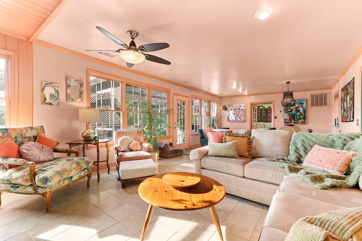 Gather, relax, and reconnect in the light-filled great room with beautiful creek views.