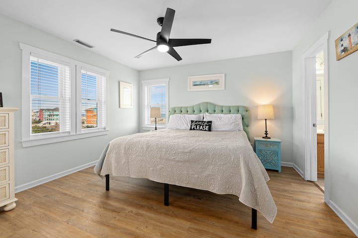 The top floor king ensuite bedroom with private front deck access is located in the Northeast corner.  The Lighthouse Room has great views of the Rodanthe Pier and Ocean views.  This bedroom has a large closet and is equipped with a TV and ROKU.