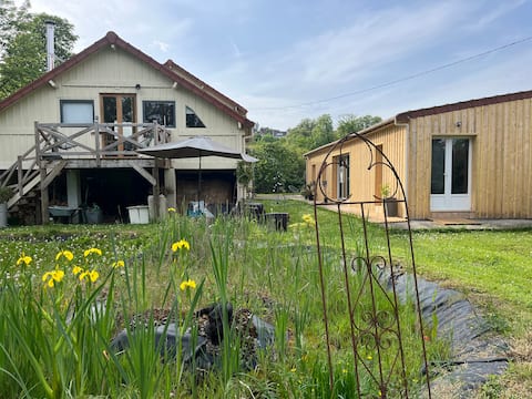 Tiny wooden house on an island with Nordic bath