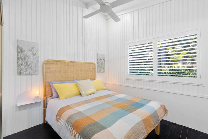 Relax in a peaceful queen room surrounded by nature