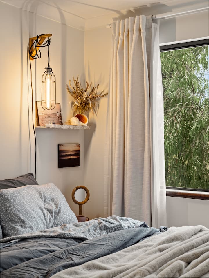 A double bed,  a super gorgeous room