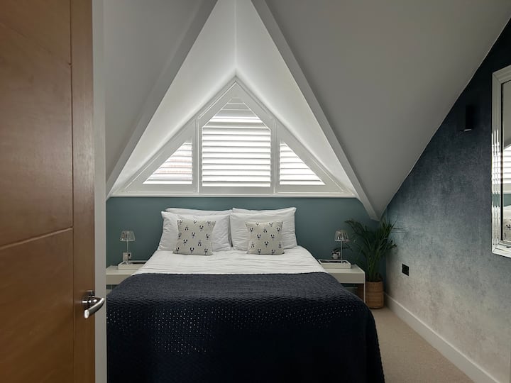 The calming interior palette is inspired by the blue seascape.