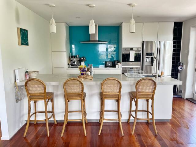 Beautiful family home with a pool and water views gallery image 5