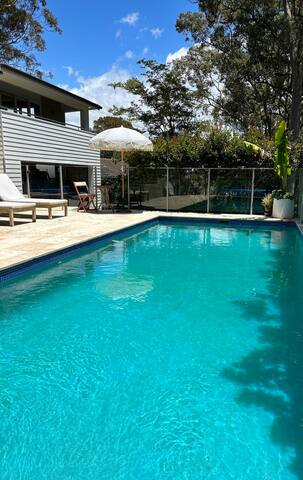 Beautiful family home with a pool and water views gallery image 3