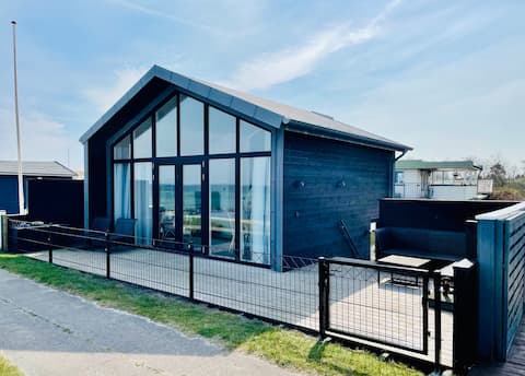 Romantic beach house with sea view in the first row