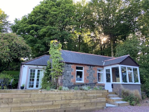 Estate cottage in extensive gardens.