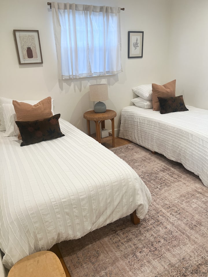 Two single beds suitable for children or adults. Can also be pushed together for King size mattress.
