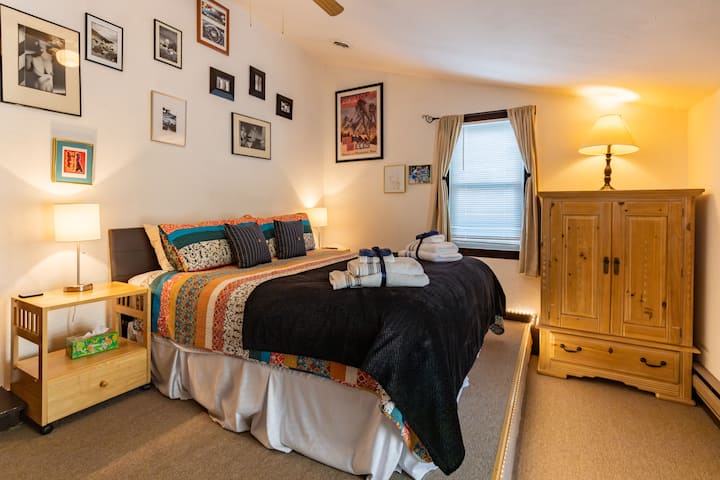 Bedroom with more fun artwork for you to enjoy