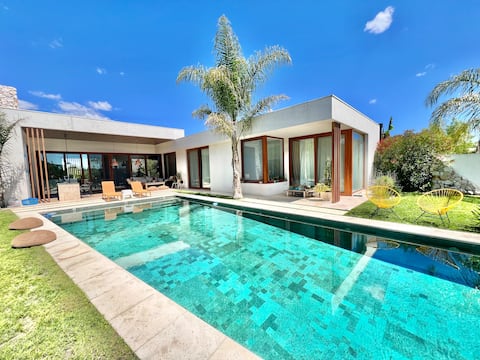 Spectacular designer house on the lagoon with a pool