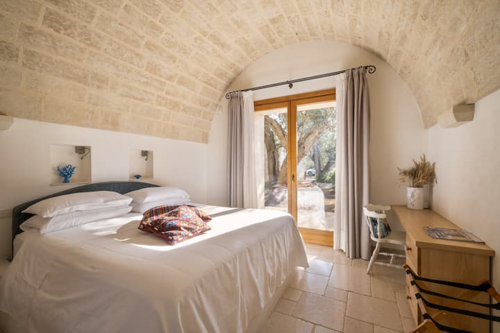 Wake up to quiet olive grove views. 