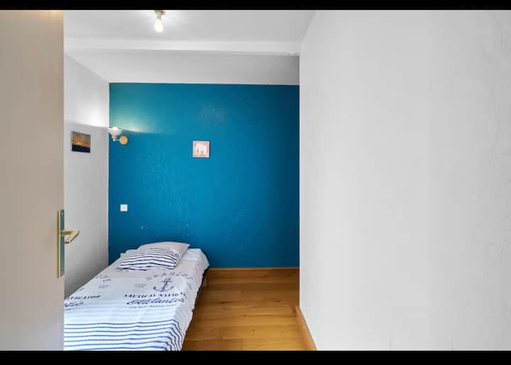 En-suite bedroom with upstairs balcony