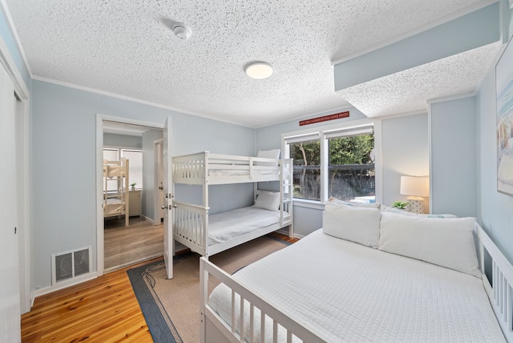 Fun and functional bunk rooms keep kids excited and close by — a home-away-from-home space that feels playful.