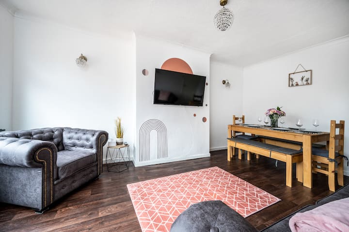 Sala de estar en The Cosy Corner Nationwide LTD.