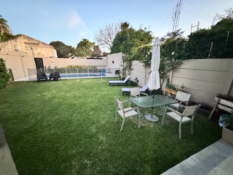 Cheerful house with pool, garden, and balcony