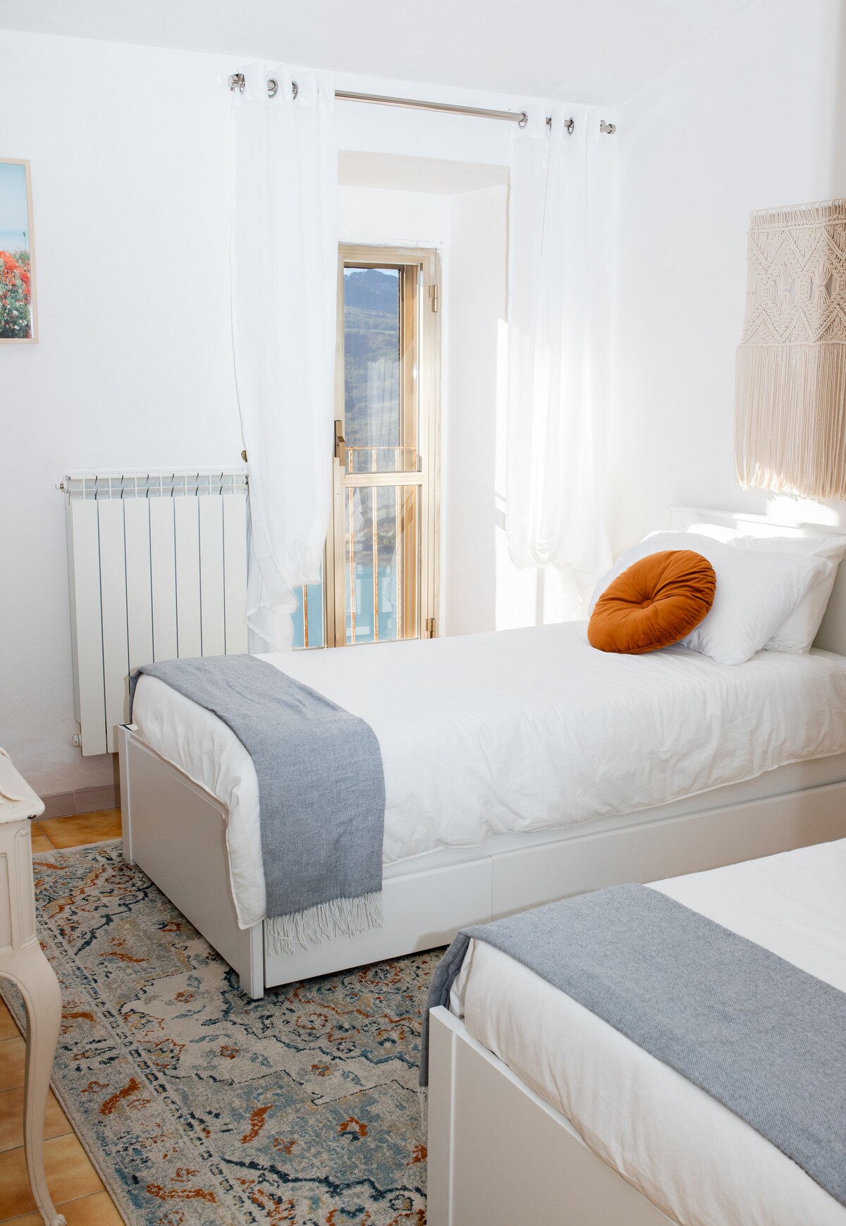 Enjoy our cozy double twin bed guest room with the most amazing Juliet balcony overlooking Lake Bomba and the Majella mountains.