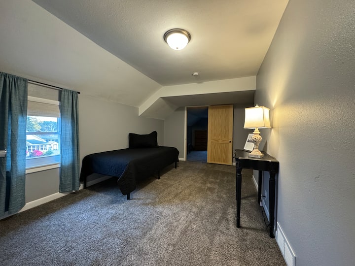 Bedroom 4 upstairs-twin bed with room darkening curtains (you pass thru this bedroom to get to the 5th bedroom)