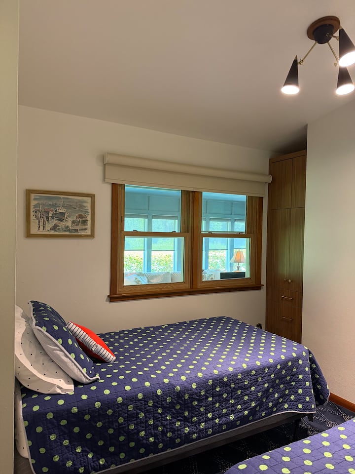 Cozy bedroom with twin beds and a built in closet where you'll find the bedding for living room sofa sleeping.  Comfy enough for adult sleeping, but whimsically ideal for the kids!